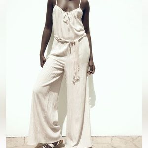 NWT wide leg cream jumpsuit with macrame belt